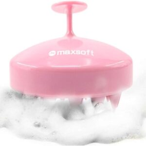 Light pink Maxsoft scalp massage shampoo brush submerged in soapy water, featuring soft silicone bristles and an ergonomic handle for easy grip