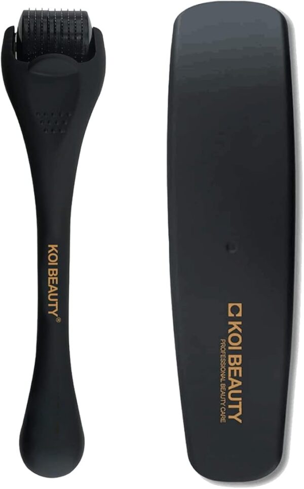 Image of a black dermaroller from KOI Beauty, displayed alongside its protective case. The dermaroller features a handle with the brand name in gold lettering and a roller head covered with numerous micro-needles, designed for skin treatment