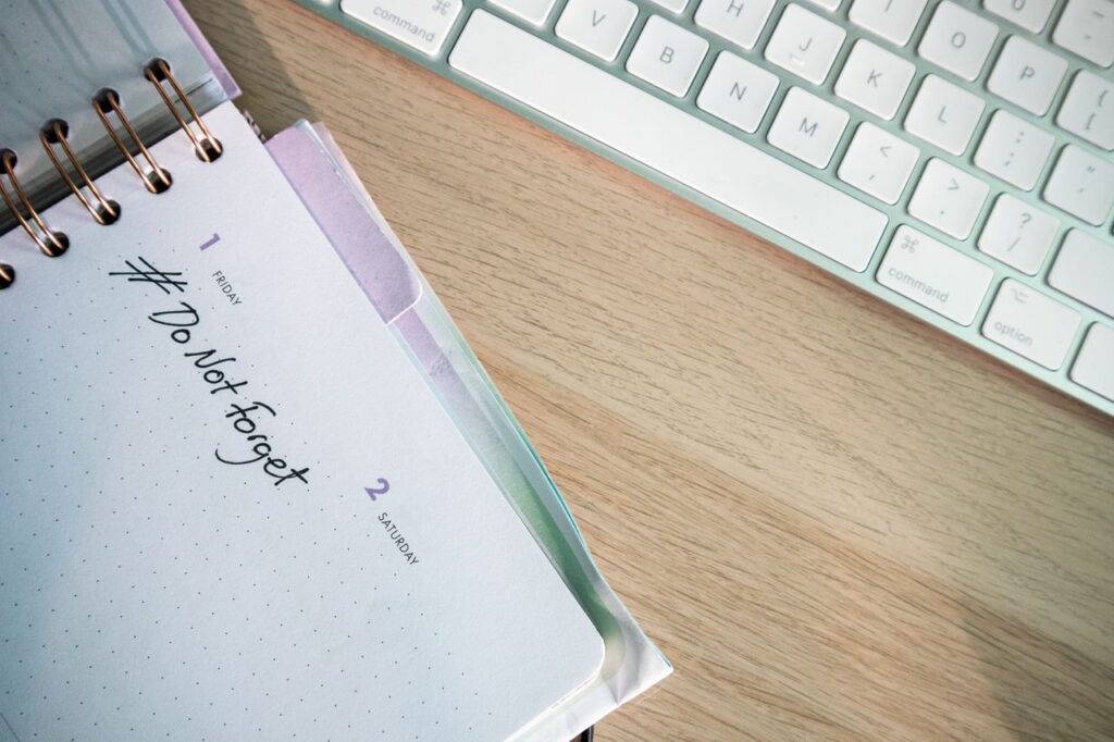 pexels-photo-15595289-15595289 A close-up shot of a planner and keyboard on a desk, showcasing organization.