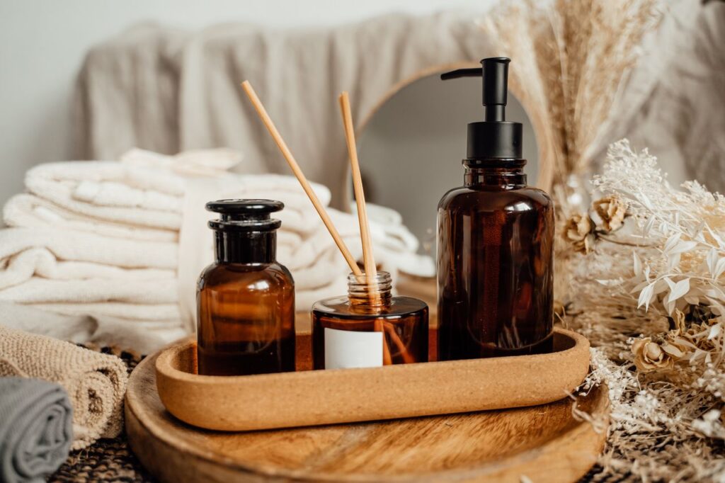 pexels-photo-7795819-7795819 Brown glass bottles and dried botanicals create a serene spa vibe.
